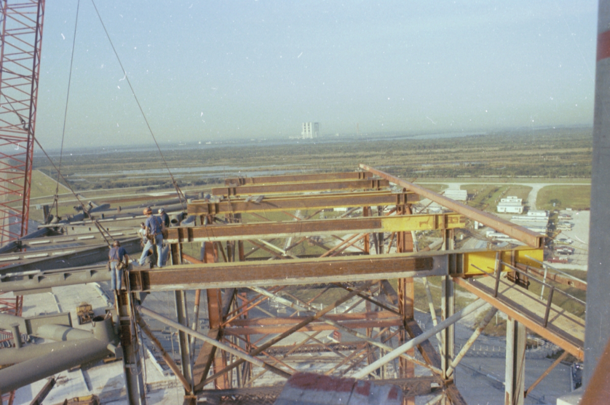 Medium-format photograph of RSS Bottom Truss lift by Wilhoit, viewed from the FSS, showing Falsework which will support the Bottom Truss and all of the rest of the RSS as it is being constructed. Photo Credit: Gene Hajdaj. Medium-format photograph of RSS Bottom Truss lift by Wilhoit, viewed from the FSS, showing Falsework which will support the Bottom Truss and all of the rest of the RSS as it is being constructed. Photo Credit: Gene Hajdaj.